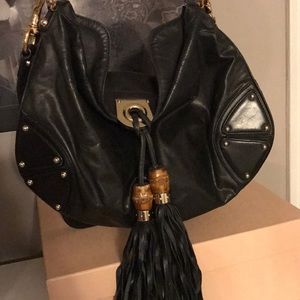 Gucci leather bag with bamboo details